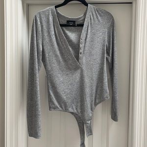 Vici grey body suit with functioning buttons.